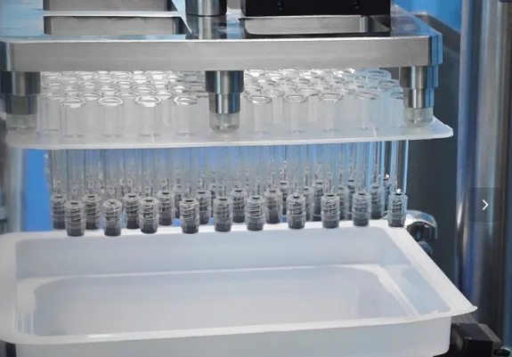 Prefilled syringe vacuum filling and stoppering machine Prefilled syringe vacuum filling and stoppering machine